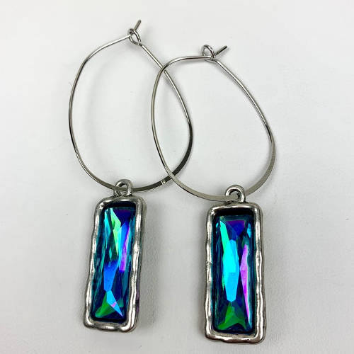 Oval Iridescent Blue Hammered Drop Charm Earrings (flat display)