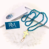 Turquoise Necklace with Gold Hammered Cross & Drop Crystal - Image 2